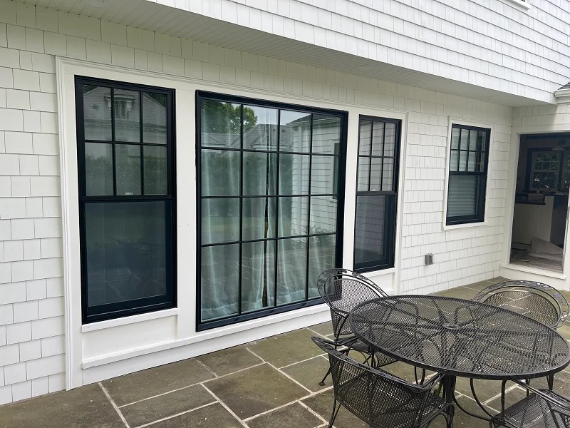 Floor to ceiling black Andersen windows